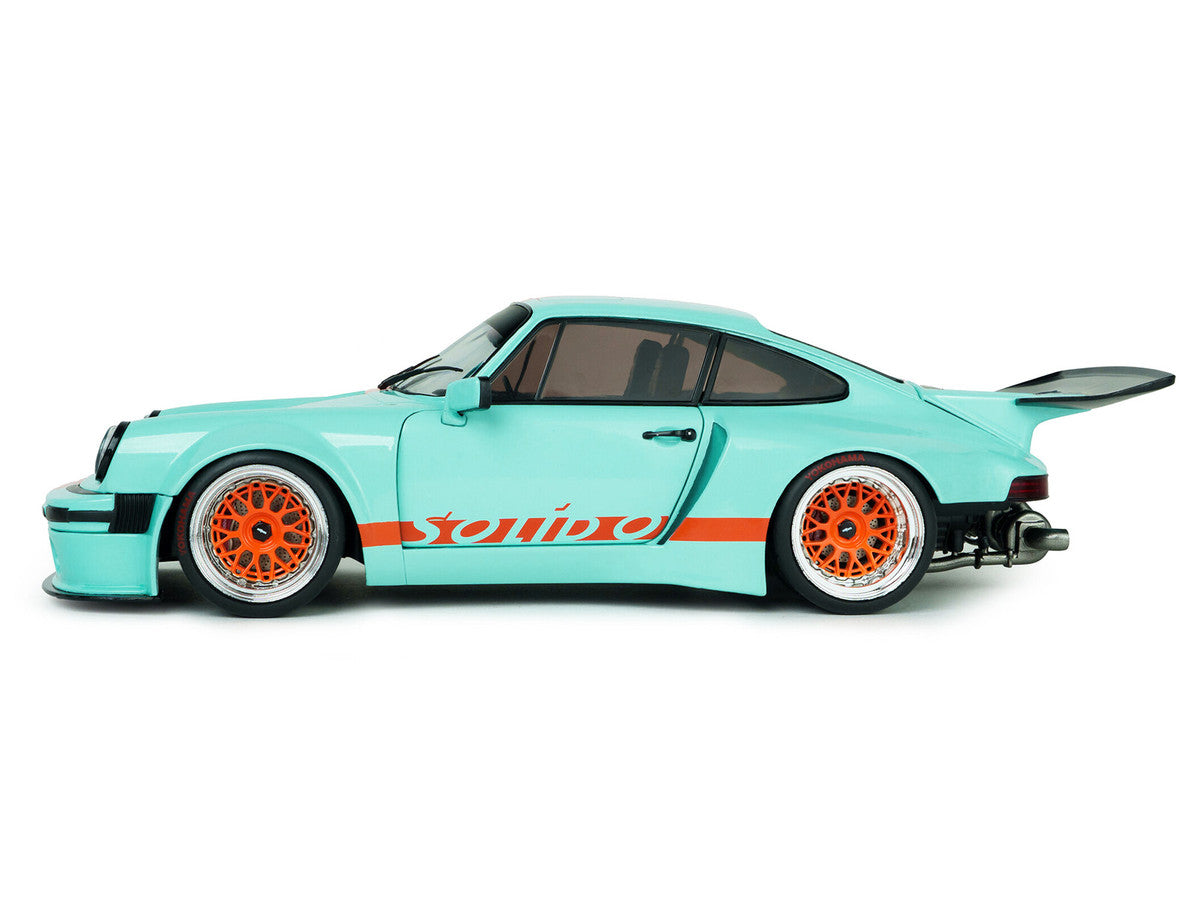 2025 Porsche 911 KS-R by Khyzyl Saleem "Blue Racer" Light Blue with Orange Stripes 1/18 Diecast Model Car by Solido Solido