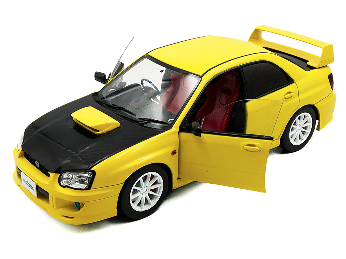 2003 Subaru Impreza WRX STI RHD (Right Hand Drive) Yellow with Carbon Hood 1/18 Diecast Model Car by Solido Solido