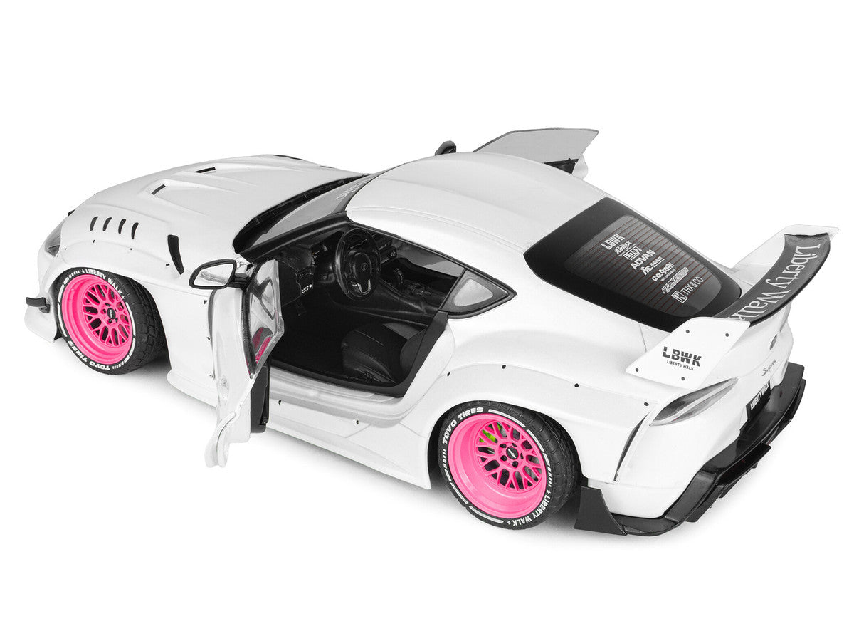 2025 Toyota GR Supra "Liberty Walk" Body Kit White Metallic with Pink Wheels 1/18 Diecast Model Car by Solido Solido