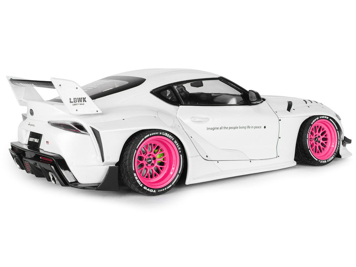 2025 Toyota GR Supra "Liberty Walk" Body Kit White Metallic with Pink Wheels 1/18 Diecast Model Car by Solido Solido