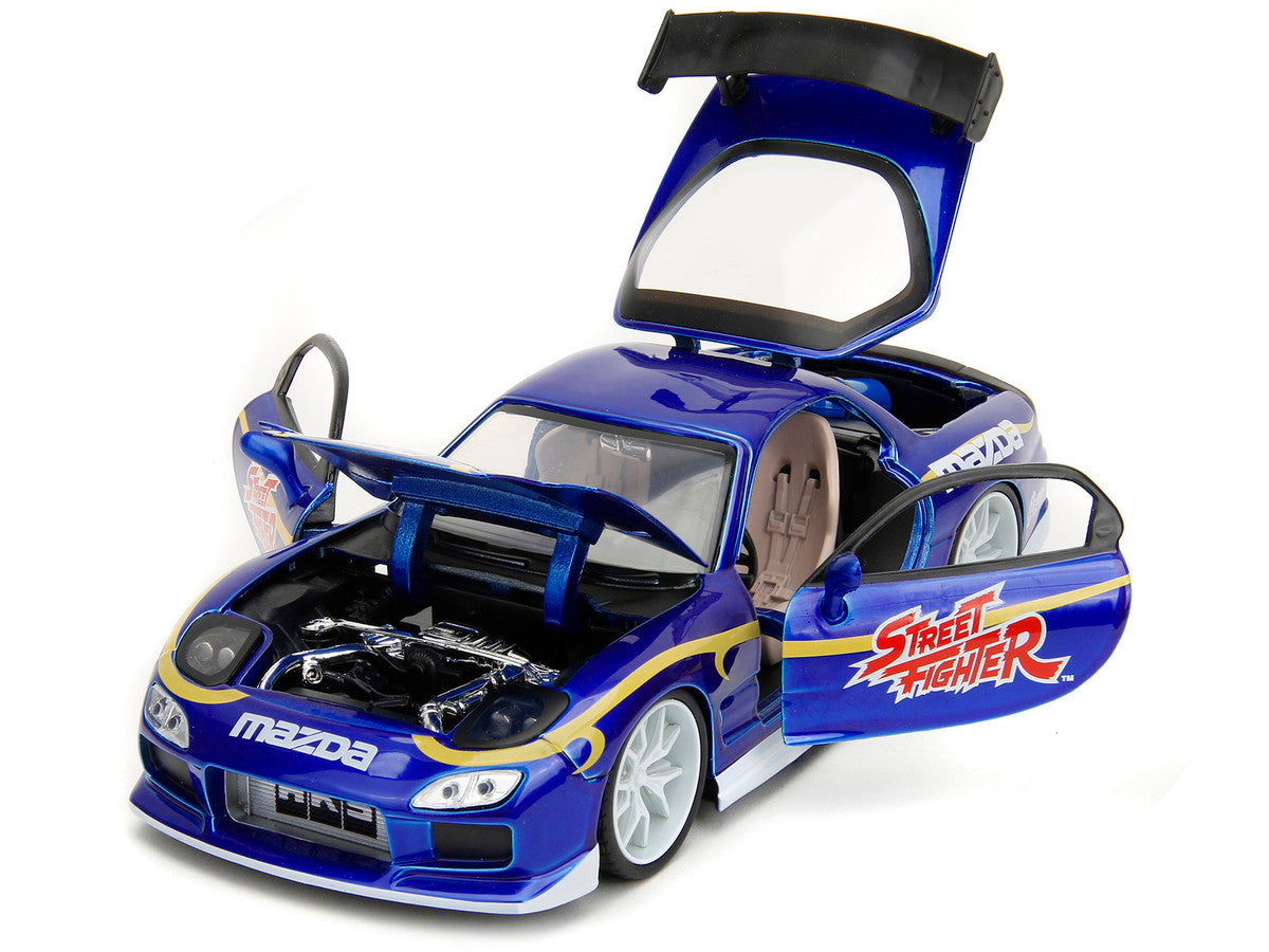 1993 Mazda RX-7 Candy Blue Metallic with Graphics and Chun-Li Diecast Figure "Street Fighter" Video Game "Anime Hollywood Rides" Series 1/24 Diecast Model Car by Jada Jada