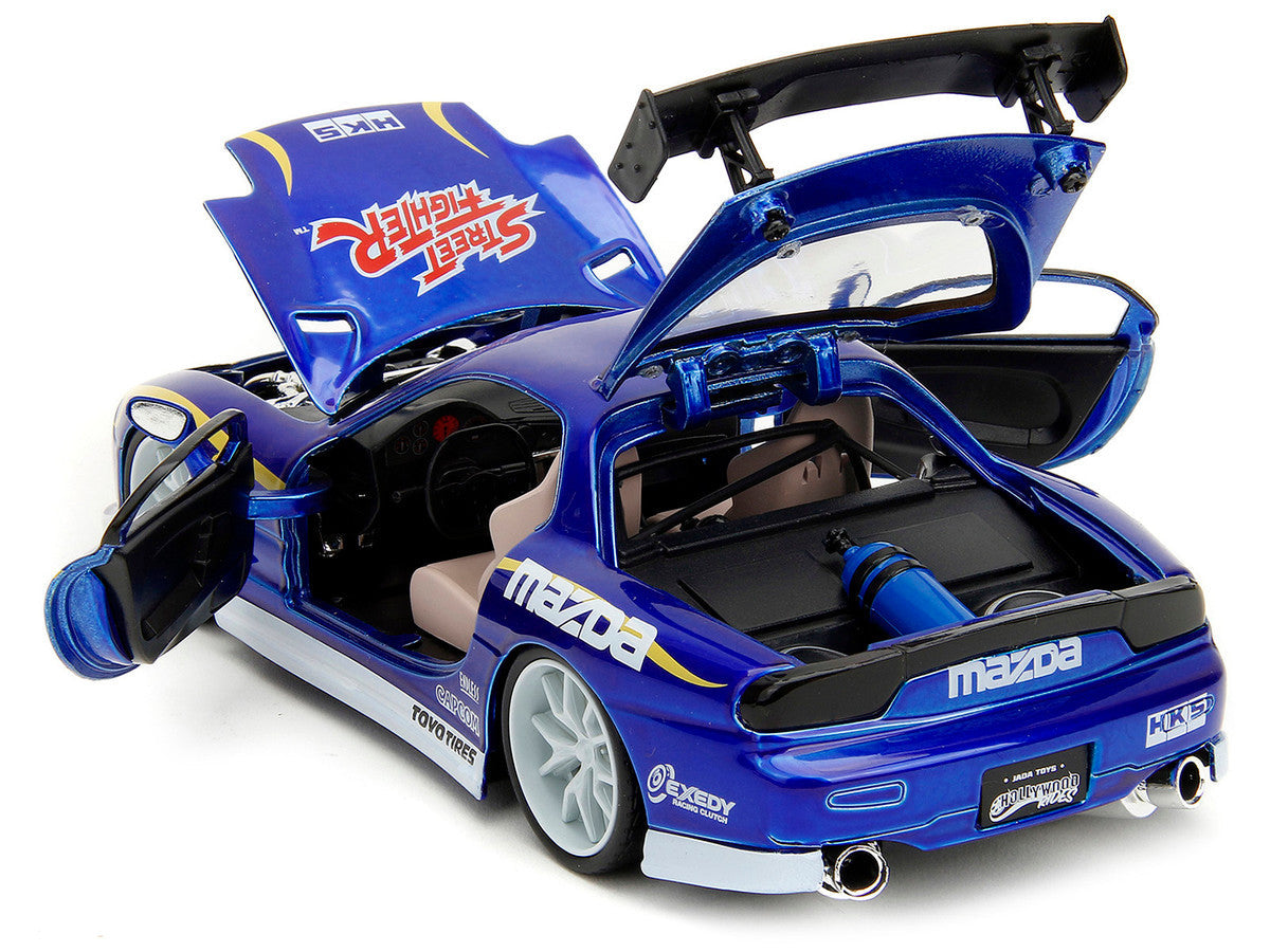 1993 Mazda RX-7 Candy Blue Metallic with Graphics and Chun-Li Diecast Figure "Street Fighter" Video Game "Anime Hollywood Rides" Series 1/24 Diecast Model Car by Jada Jada