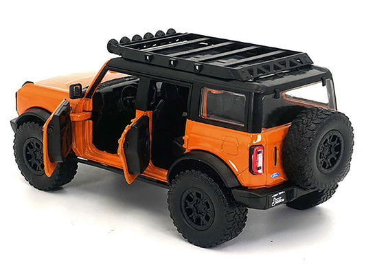 2021 Ford Bronco Orange with Black Stripes and Roof Rack "Just Trucks" Series 1/24 Diecast Model Car by Jada Jada