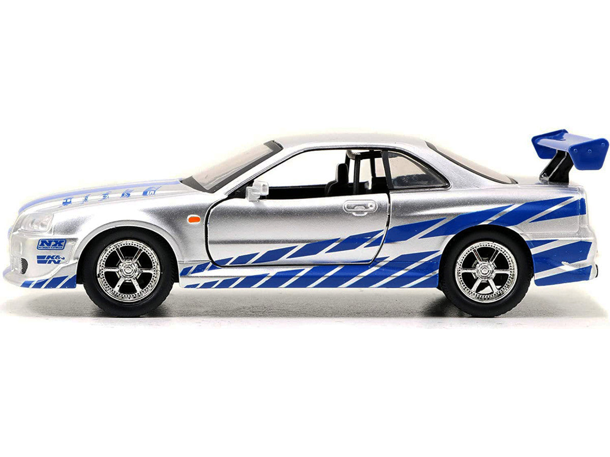 Brian's Nissan Skyline GT-R (R34) RHD (Right Hand Drive) Silver Metallic with Blue Stripes "2 Fast 2 Furious" (2003) Movie "Fast & Furious 25th Anniversary" Series 1/32 Diecast Car Model by Jada Jada