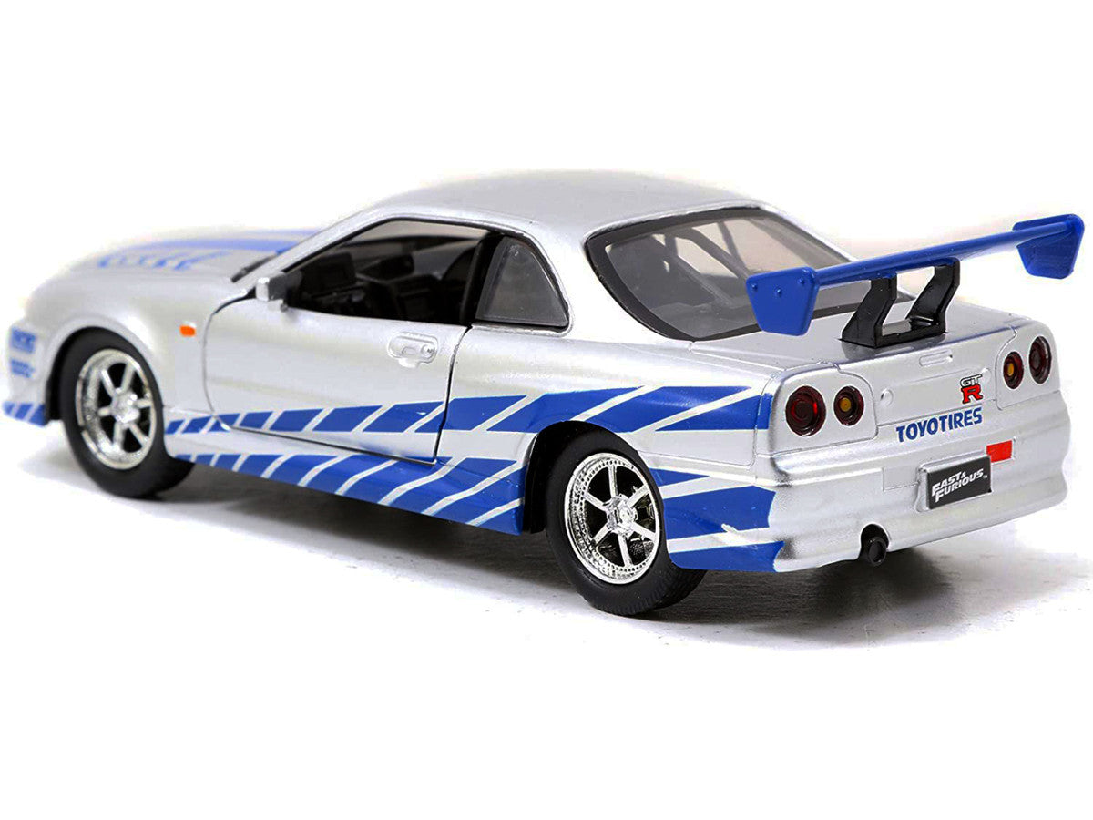 Brian's Nissan Skyline GT-R (R34) RHD (Right Hand Drive) Silver Metallic with Blue Stripes "2 Fast 2 Furious" (2003) Movie "Fast & Furious 25th Anniversary" Series 1/32 Diecast Car Model by Jada Jada