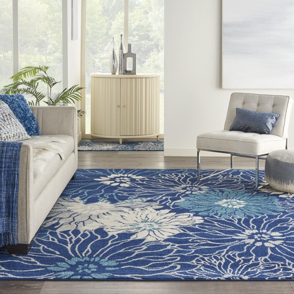 8' X 10' Blue And Ivory Floral Power Loom Area Rug