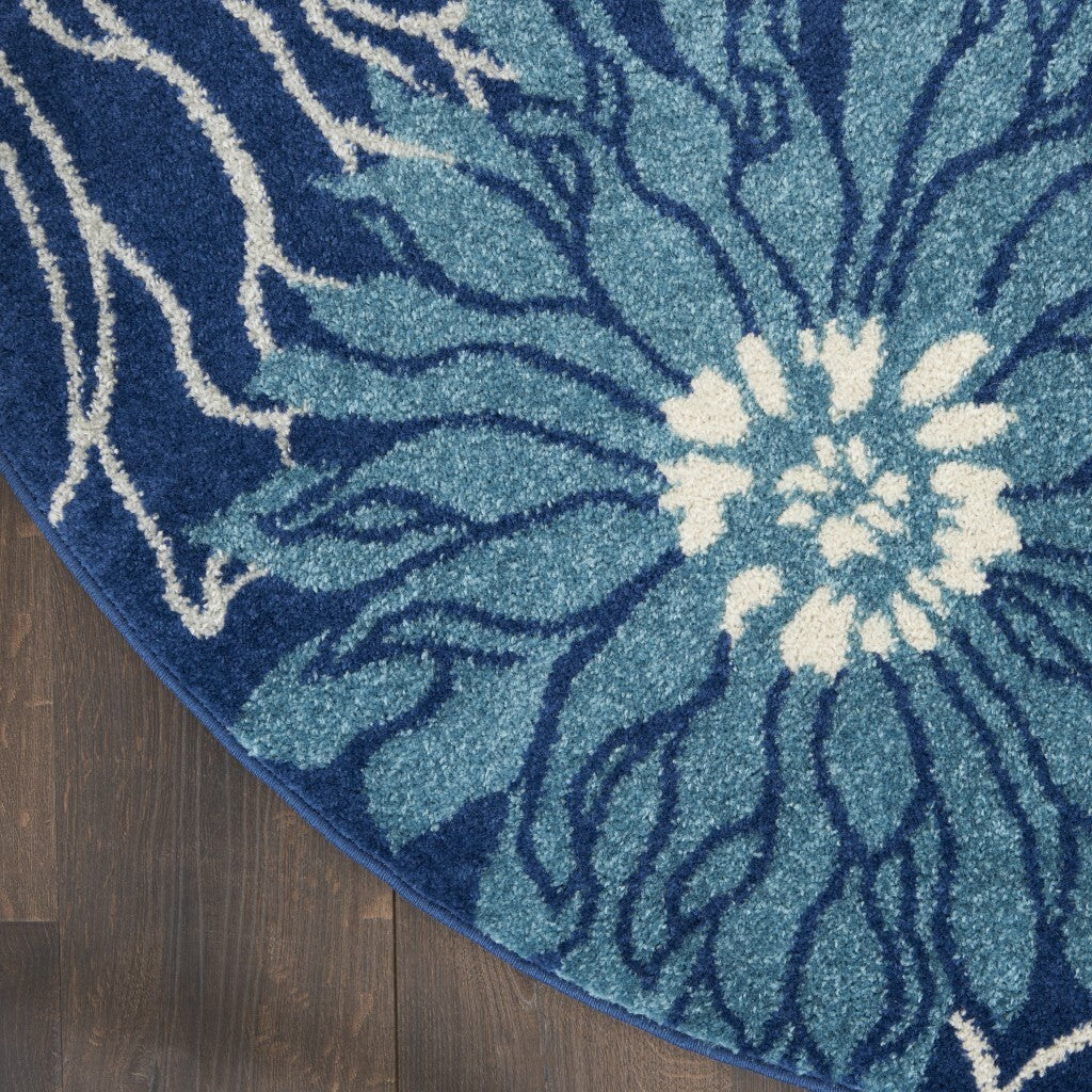 8' Blue And Ivory Round Floral Dhurrie Area Rug