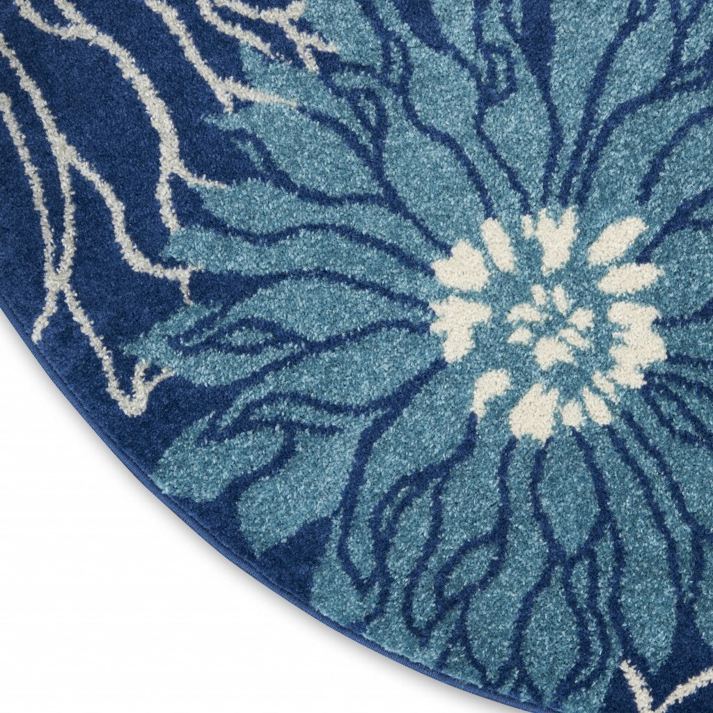 8' Blue And Ivory Round Floral Dhurrie Area Rug