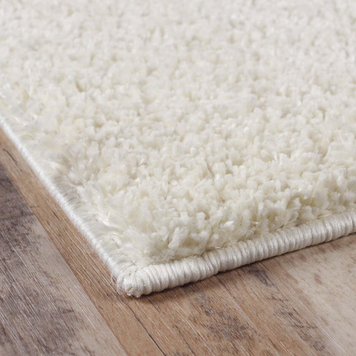 5' X 8' Ivory Shag Stain Resistant Area Rug