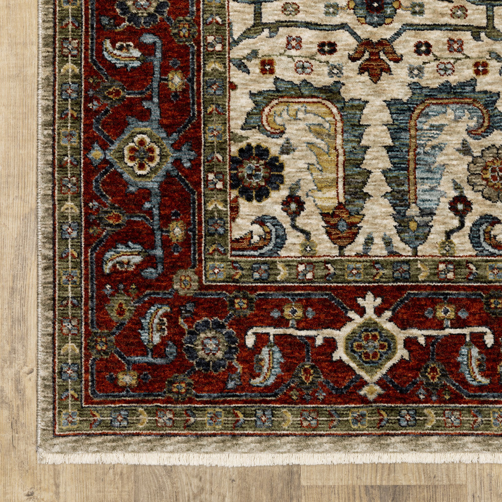 3' X 5' Ivory Red Green Grey Blue And Navy Oriental Power Loom Stain Resistant Area Rug With Fringe