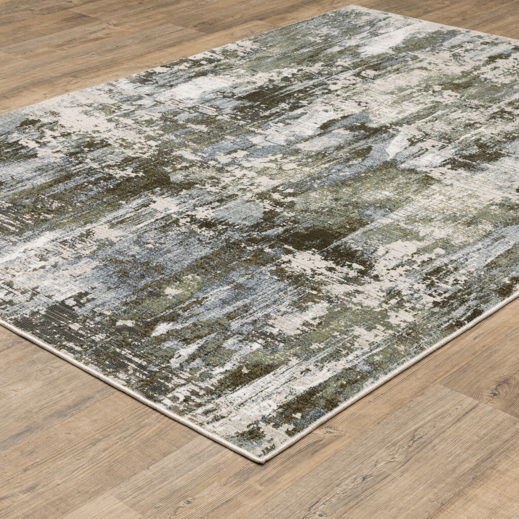 5' X 8' Green Blue Grey Ivory And Brown Abstract Power Loom Stain Resistant Area Rug