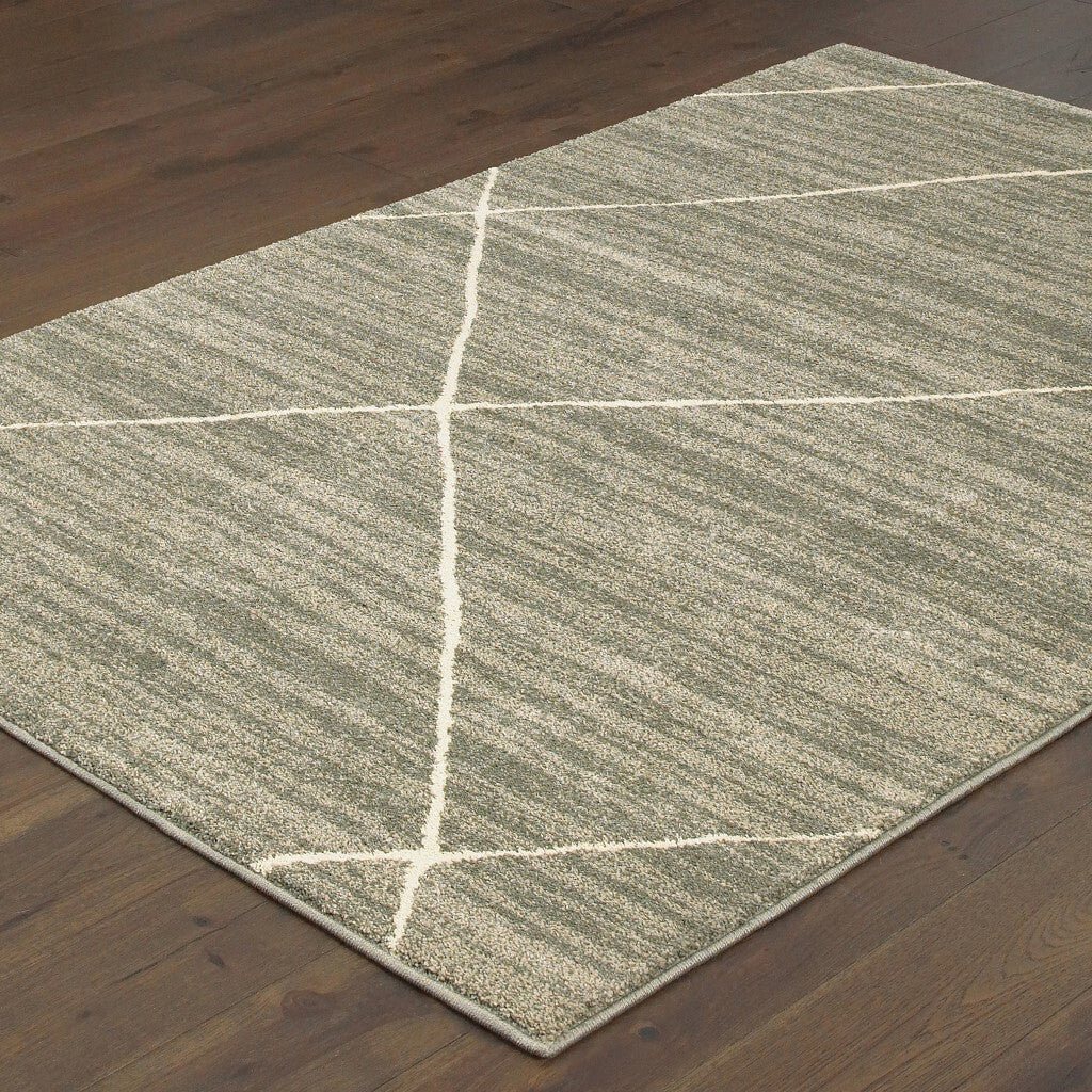 5' X 7' Grey And Ivory Geometric Power Loom Stain Resistant Area Rug