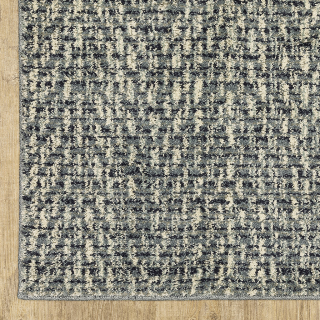 5' X 7' Blue Ivory Grey And Light Blue Geometric Power Loom Stain Resistant Area Rug