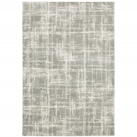 5' X 8' Grey And Ivory Abstract Shag Power Loom Stain Resistant Area Rug