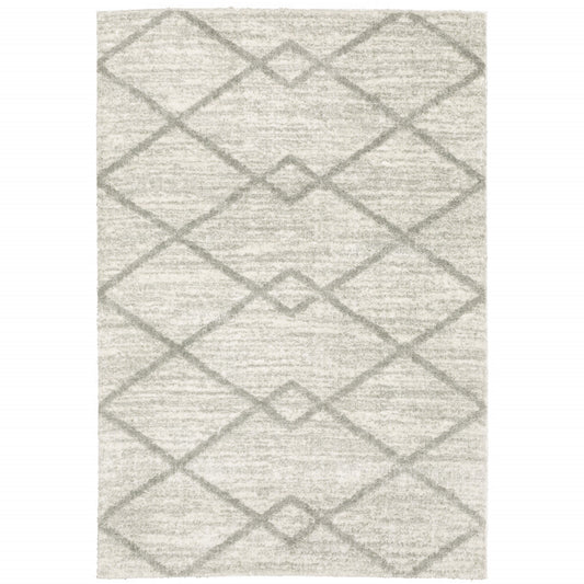 4' X 6' Ivory And Grey Geometric Shag Power Loom Stain Resistant Area Rug