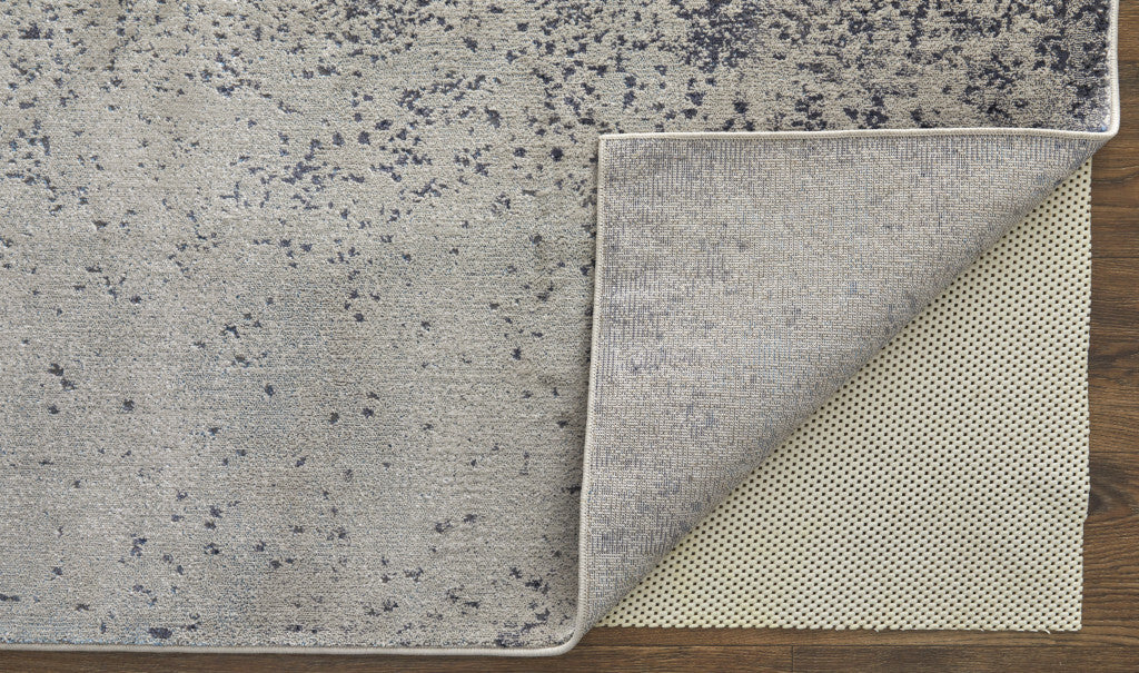 5' X 8' Ivory and Blue Abstract Power Loom Non Skid Area Rug