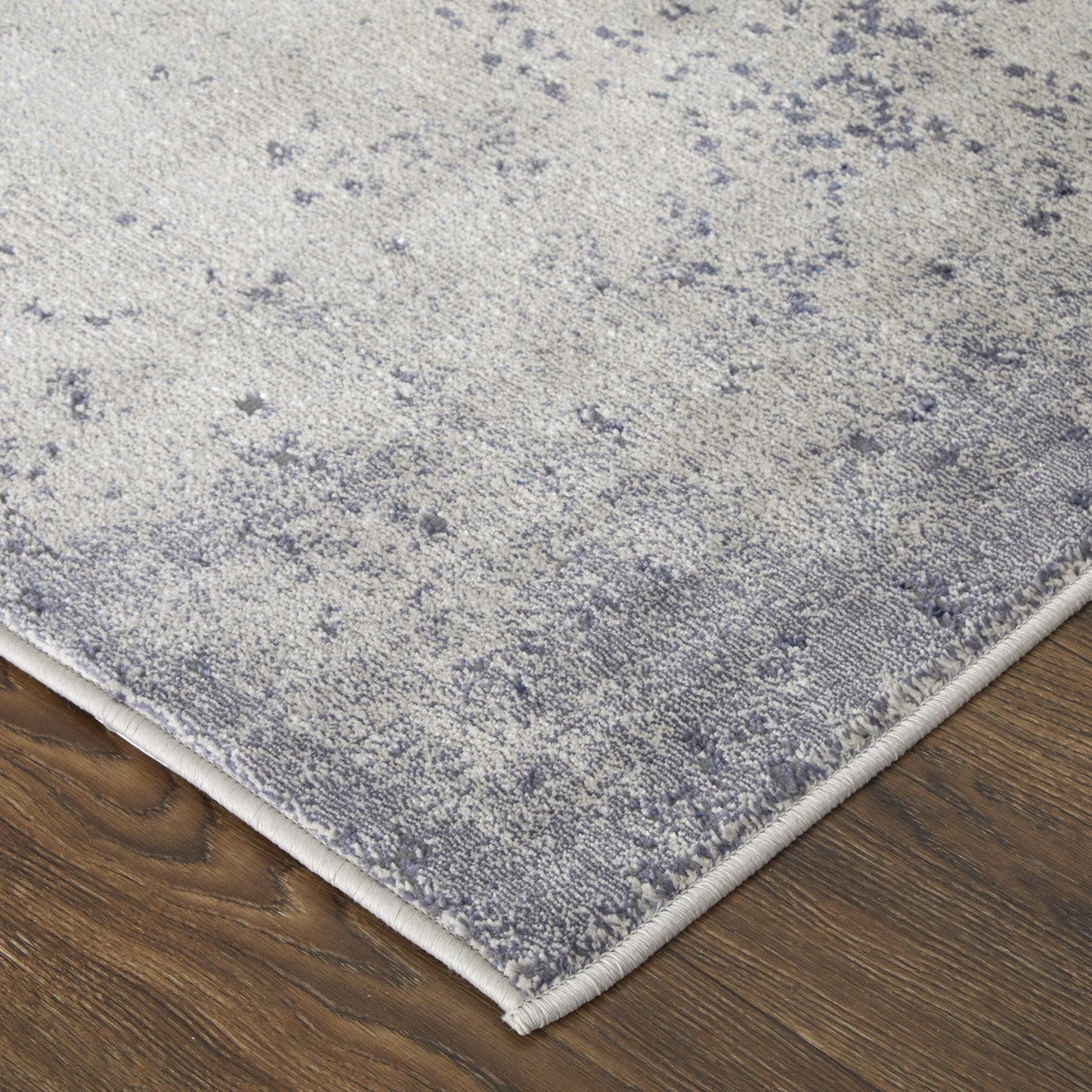 5' X 8' Ivory and Blue Abstract Power Loom Non Skid Area Rug