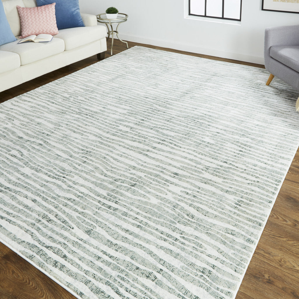 5' X 8' Gray Green And Ivory Striped Distressed Stain Resistant Area Rug